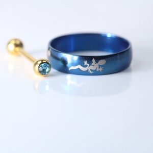 golden tone surgical steel ocean gem barbel and motive Ring New!